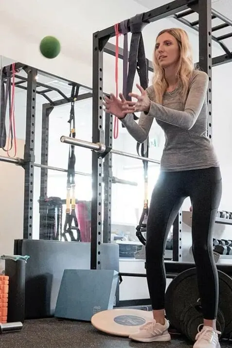 Easy Allied Health practitioner guiding a balance exercise